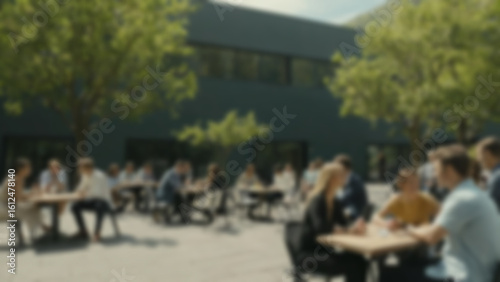 Wallpaper Mural blurry image of a group of people sitting in a park filled with trees, blur wallpaper. Torontodigital.ca