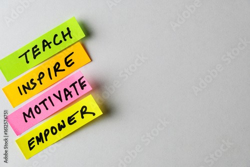 Colorful Sticky Notes Highlight Inspirational Words on a Grey Background