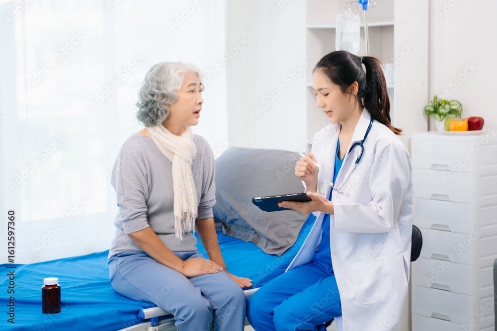 Obraz premium Smiling doctor discussing health with elderly patient. Perfect for medical, healthcare, caregiving,
