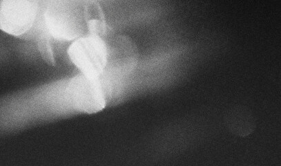 retro film overlay effect with scratch dust and light leaks, retro grain noisy film distressed texture light leak flare on black background, Black and white background