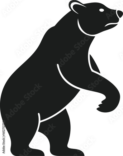 Black silhouette of a grizzly bear standing upright on its hind legs with a powerful presence
