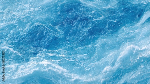 Deep blue ocean water showcases waves in motion, reflecting sunlight and creating a lively, dynamic pattern. The scene evokes a sense of calm and tranquility, perfect for relaxation.