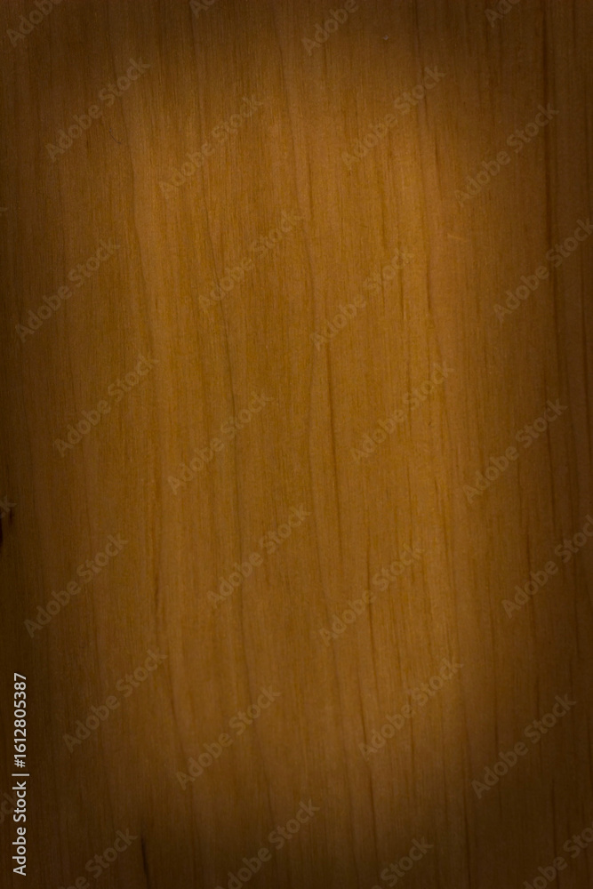 Naklejka premium wooden background, board surface, natural light wood pattern, alder, vignetting, frame with a place for text or object, vertical