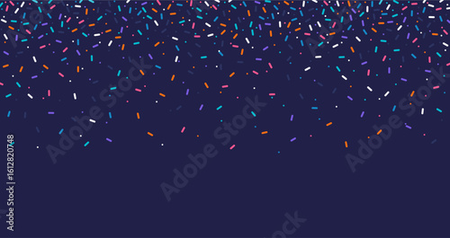 Colorful confetti sprinkles falling on dark background, festive decoration pattern for party, celebration, holiday or abstract fun concept