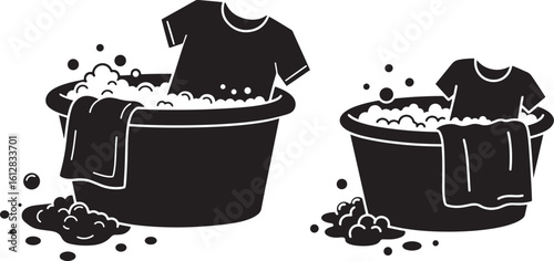 Two buckets of soapy water with clothes silhouette