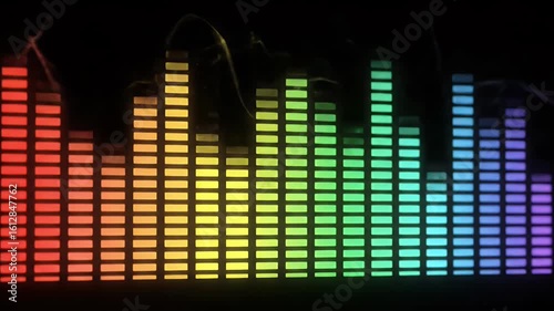 A vibrant spectrum of illuminated audio level meters displays dynamic sound visualization.
