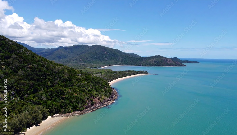 Naklejka premium Lush coastline with turquoise water and mountains
