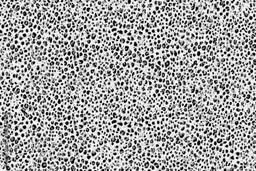 Monochrome abstract print featuring densely packed, varied-sized spots