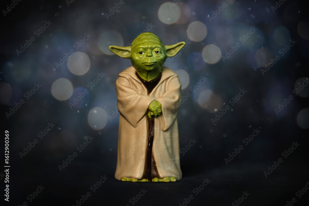 Naklejka premium Closeup of Yoda action figure character from the Star Wars movie saga. Illustrative editorial