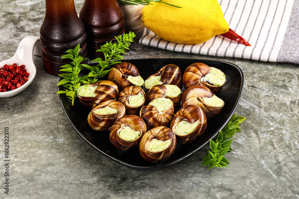Fototapeta premium Fresnch escargort with basil butter