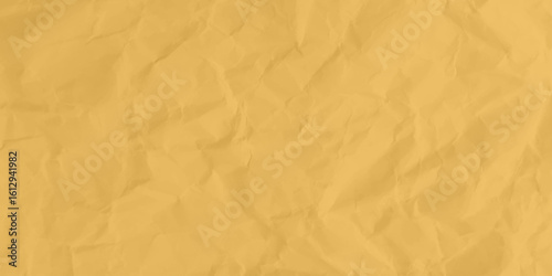 Abstract background of crumpled yellow paper stock photo