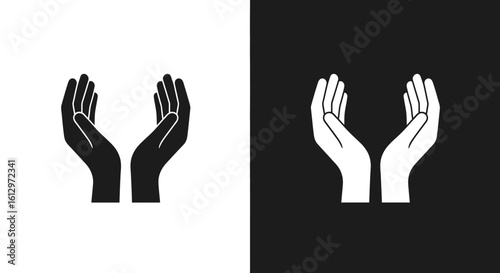 Two hands, one black and one white, facing upwards, representing unity.