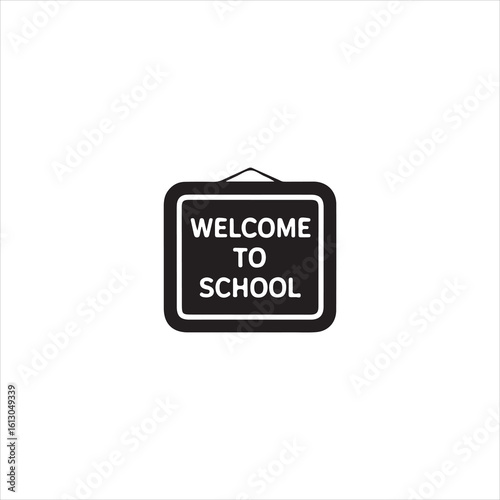 Black welcome to school sign with white text hanging on a white background welcome sign black and white
