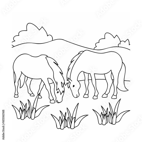 Two horses grazing in a field grass