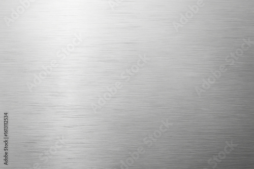 Brushed metal texture with subtle light reflection and horizontal lines