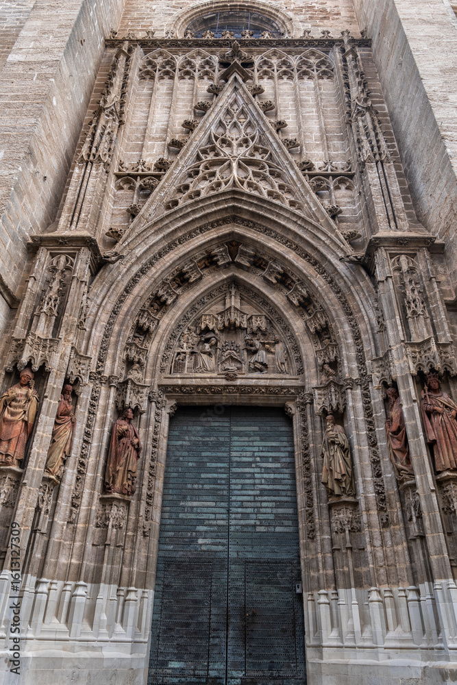 Fototapeta premium Puerta de San Miguel at Seville Cathedral in Spain