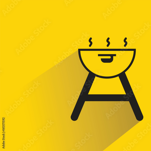 bbq grill icon with shadow on yellow background