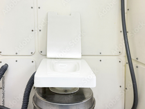 Fototapeta Naklejka Na Ścianę i Meble -  Old space toilet for zero gravity white color.