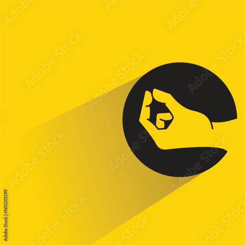 hand picking gesture circle button with shadow on yellow background