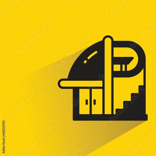 house building icon with shadow on yellow background