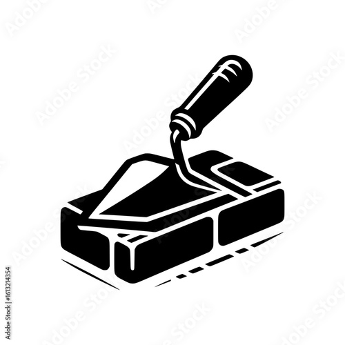 Illustration of a bricklaying trowel on top of bricks