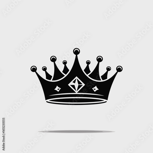 Regal black crown with diamond emblem and pointed jewels royal monarchy
