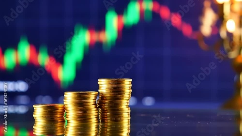 Stacked Coins Growing in Height with Stock Market Chart in Background