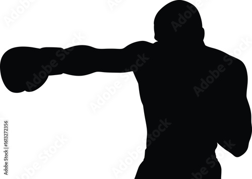 Powerful boxer in silhouette throwing a strong punch with boxing gloves on white background