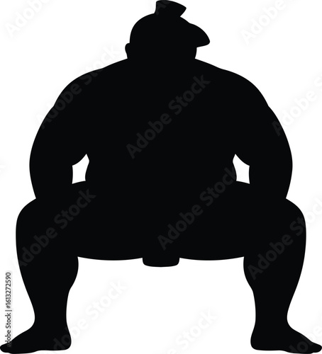 Powerful sumo wrestler in a low stance a striking black silhouette against a white background