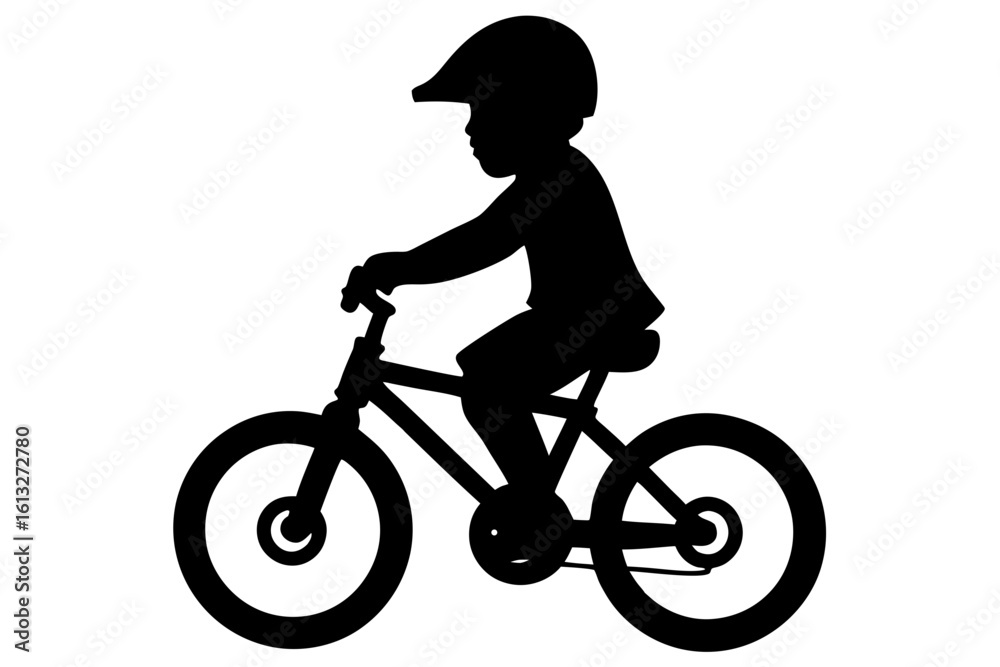 Fototapeta premium Silhouette of a Young Cyclist with Helmet Riding Bike