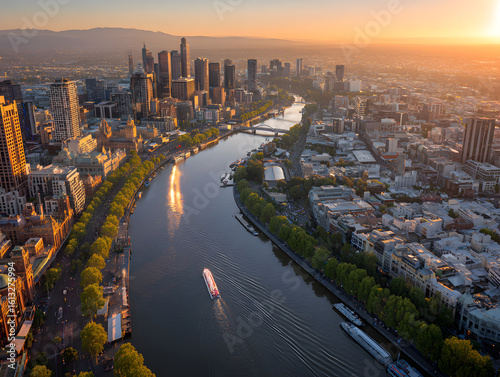 Aerial View of City at Sunset with the River and Iconic Skyline