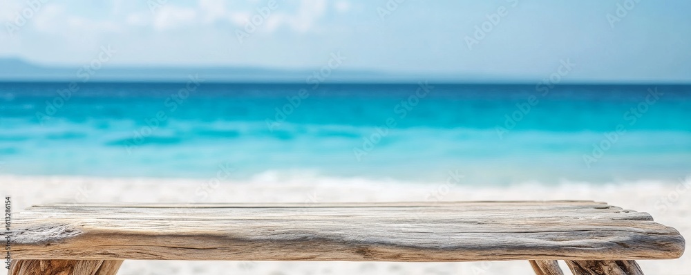 Fototapeta premium Wooden Table on a Beach with Turquoise Sea,Vacation,Summer