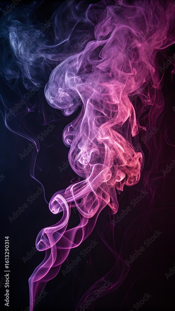 Obraz premium Wisps of colorful smoke in shades of pink and blue against a dark background