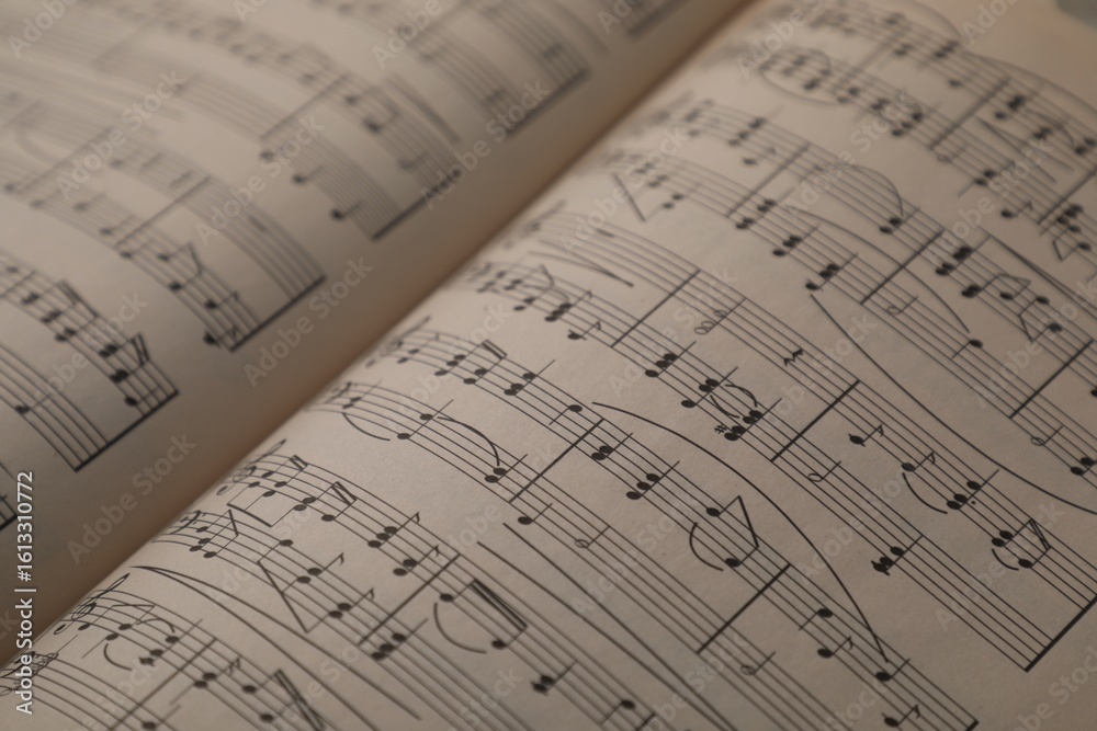 Naklejka premium Sheets with musical notes as background, closeup
