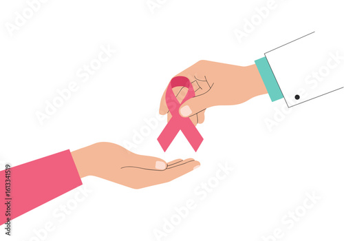Hand exchanging pink ribbon symbolizing breast cancer awareness  