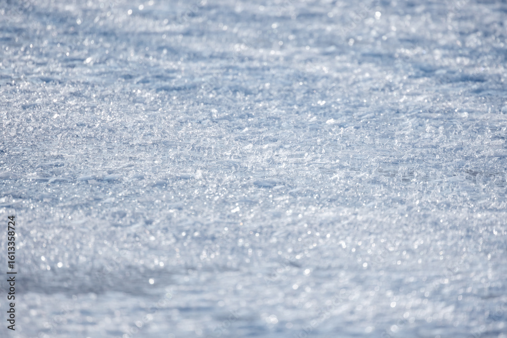 Obraz premium Close-Up of Glittering Ice Crystals on a Wintery Frozen Surface