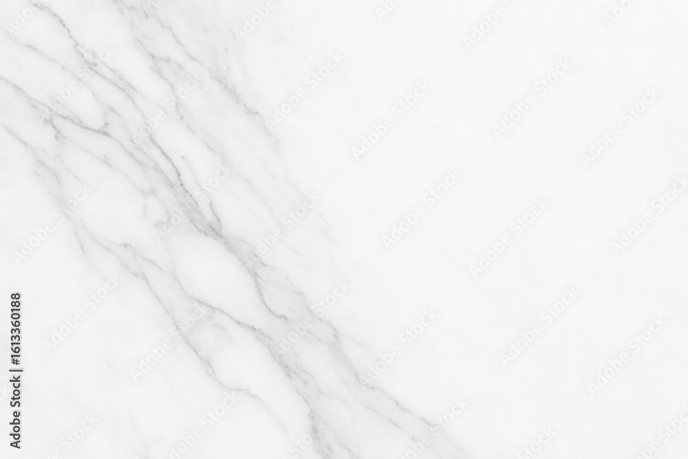 Obraz premium Minimal white marble background with soft gray veins on the left and clean space on the right - an elegant and versatile texture for presentations, packaging, and wellness branding.