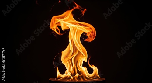 Wallpaper Mural Vibrant orange flame dances dramatically against a stark black background, creating an intense and captivating visual spectacle. Torontodigital.ca