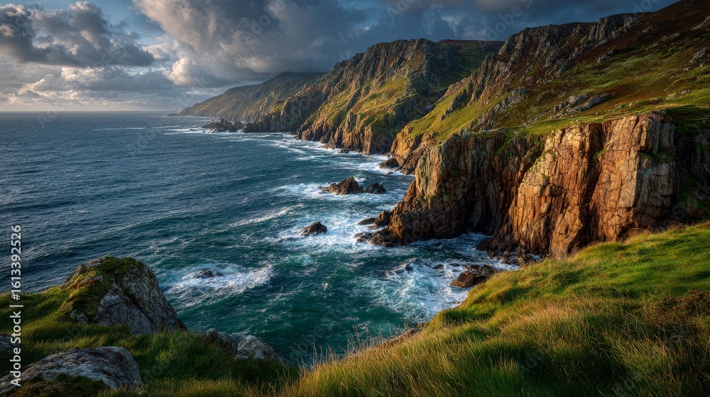 Obraz premium Dramatic coastal cliffs at golden hour