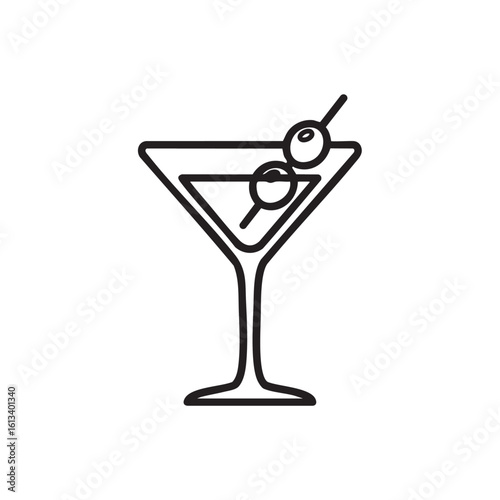 Martini glass with olives on a pick cocktail drink