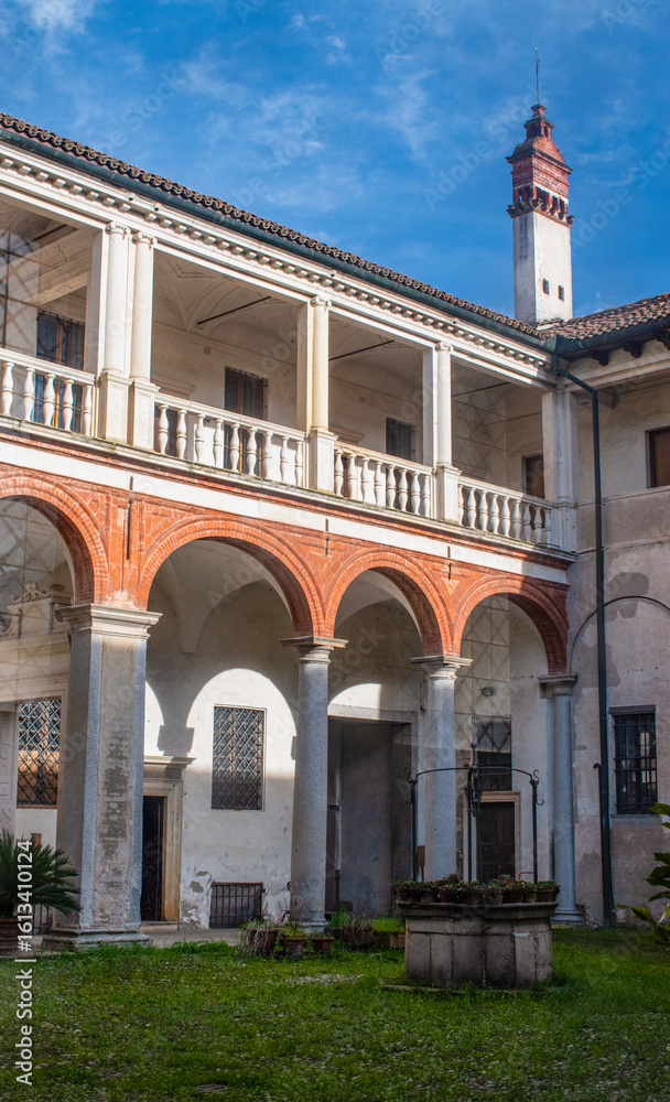 Obraz premium Italy, Europe: frescoed cloisters of the Clausura, the reserved area for cloistered monks in the Certosa di Pavia, monastery complex in Lombardy built from 1396 to 1495, seen from a window