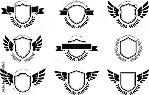 Collection of black and white shield emblems with wings, banners, and laurels