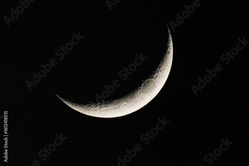 Close up of crescent moon at night