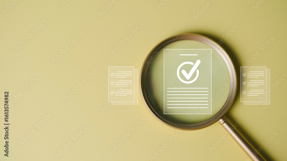 Fototapeta premium Magnifying glass focusing on approved document with checklist icon, symbolizing document quality control, verification, and approval process with copy space.