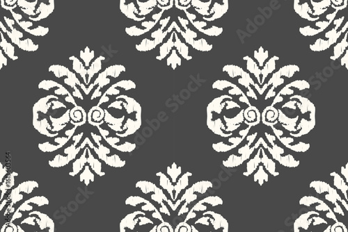 Embroidered Ikat pattern on a black background. Traditional ethnic ikat, Aztec abstract vector pattern, seamless pattern in tribal, folk embroidery and Mexican style.