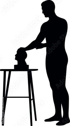 Artist sculpting head silhouette