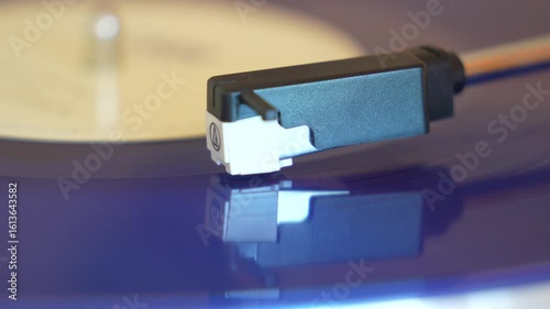 turntable with vinyl record. playing music