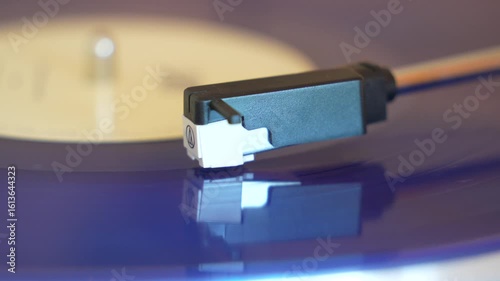 turntable with vinyl record. playing music