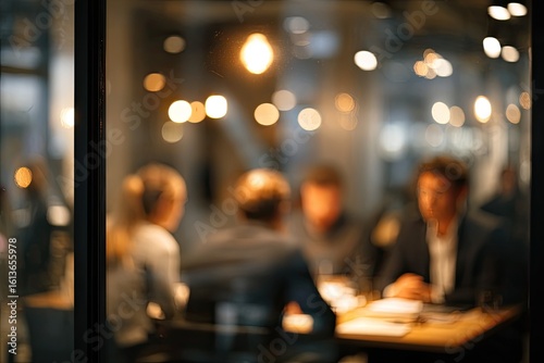 Blurred view of a business meeting in a restaurant