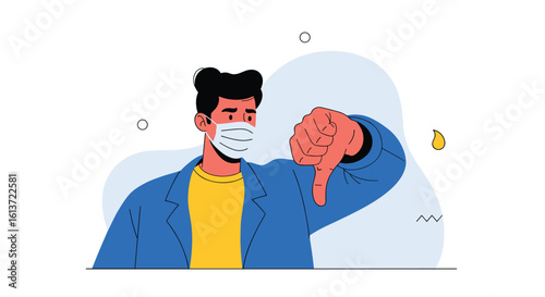 Man wearing face mask showing thumbs down gesture indicating disapproval or dislike during pandemic